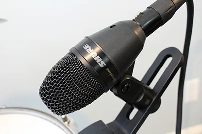Shure PGA56 drum mic closeup mounted on drum
